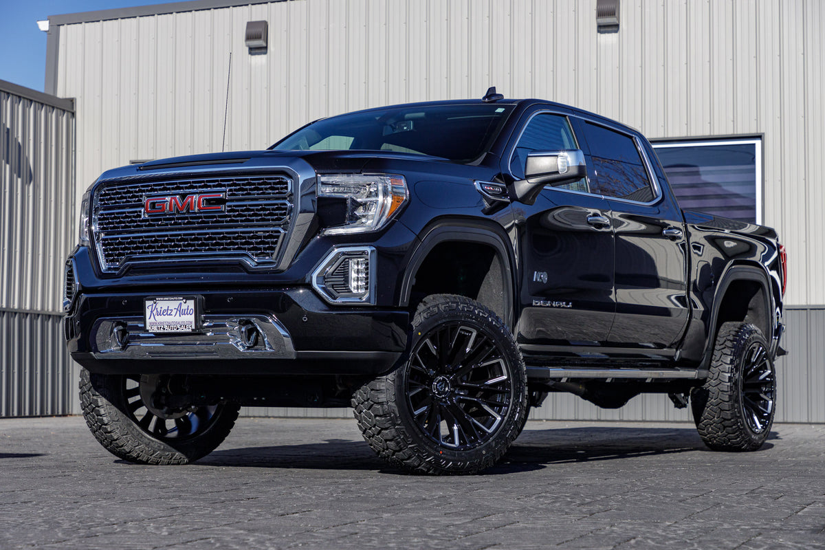 2021 GMC Sierra 1500 Denali with a 6" Rough Country suspension kit, 22x12 Fuel Rebar wheels, and 35" Fury Country Hunter R/T tires.