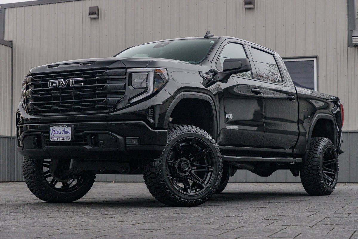 2024 GMC Sierra 1500 Elevation with a 6" Rough Country lift kit, 22x12 Fuel Brawl wheels, 35" Fury Country Hunter R/T tires.