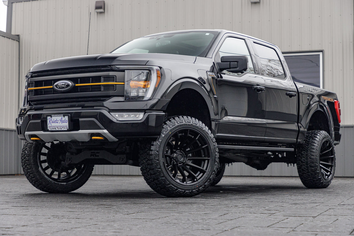2023 Ford F-150 Tremor with a 6" Rough Country lift kit, 22x12 Fuel Burn wheels, and 35" Fury Country Hunter R/T tires.