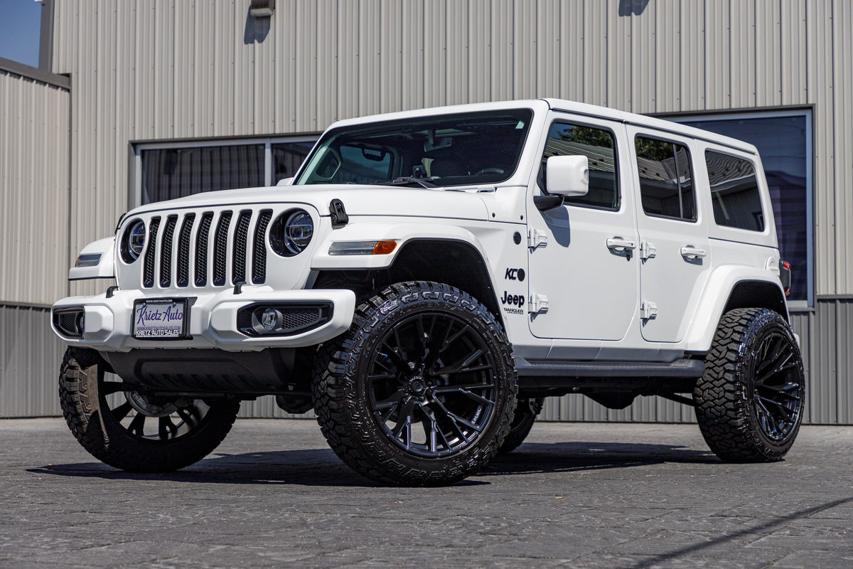 2022 Jeep Wrangler Unlimited Sahara Altitude with a 2.5" Rough Country lift kit, 22x12 Fuel Rebar wheels, and 35" Fury Country Hunter R/T tires.