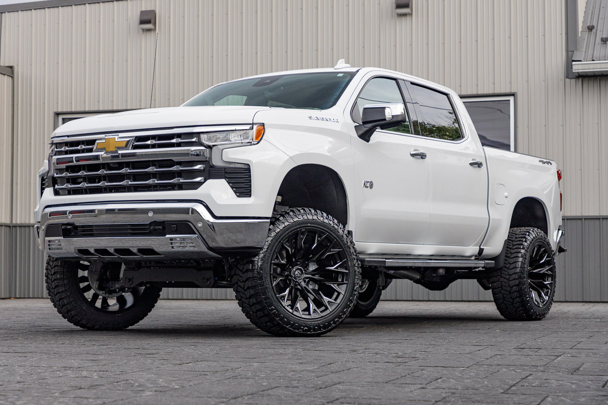 2025 Chevrolet Silverado 1500 LTZ with a 6" Rough Country lift kit, 22x12 Fuel Flame wheels, and 35" Avix Trailtek R/T tires.