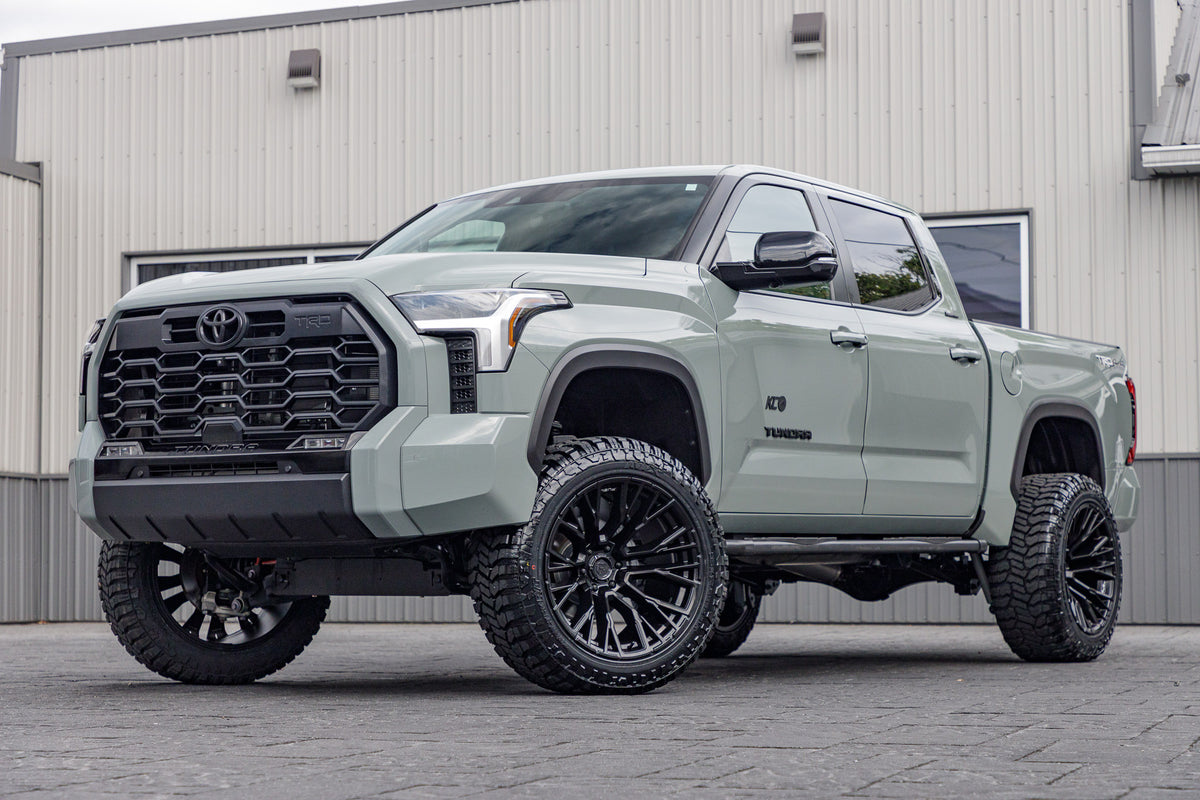 2025 Toyota Tundra Limited with a 6" Rough Country lift kit, 22x12 Fuel Rebar wheels, and 35" Avix Trailtek R/T tires.