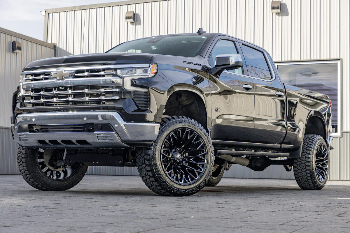 2024 Chevrolet Silverado 1500 LTZ with a 6" Rough Country lift kit, 22x12 Fuel Strike wheels, and 35" Fury Country Hunter R/T tires.