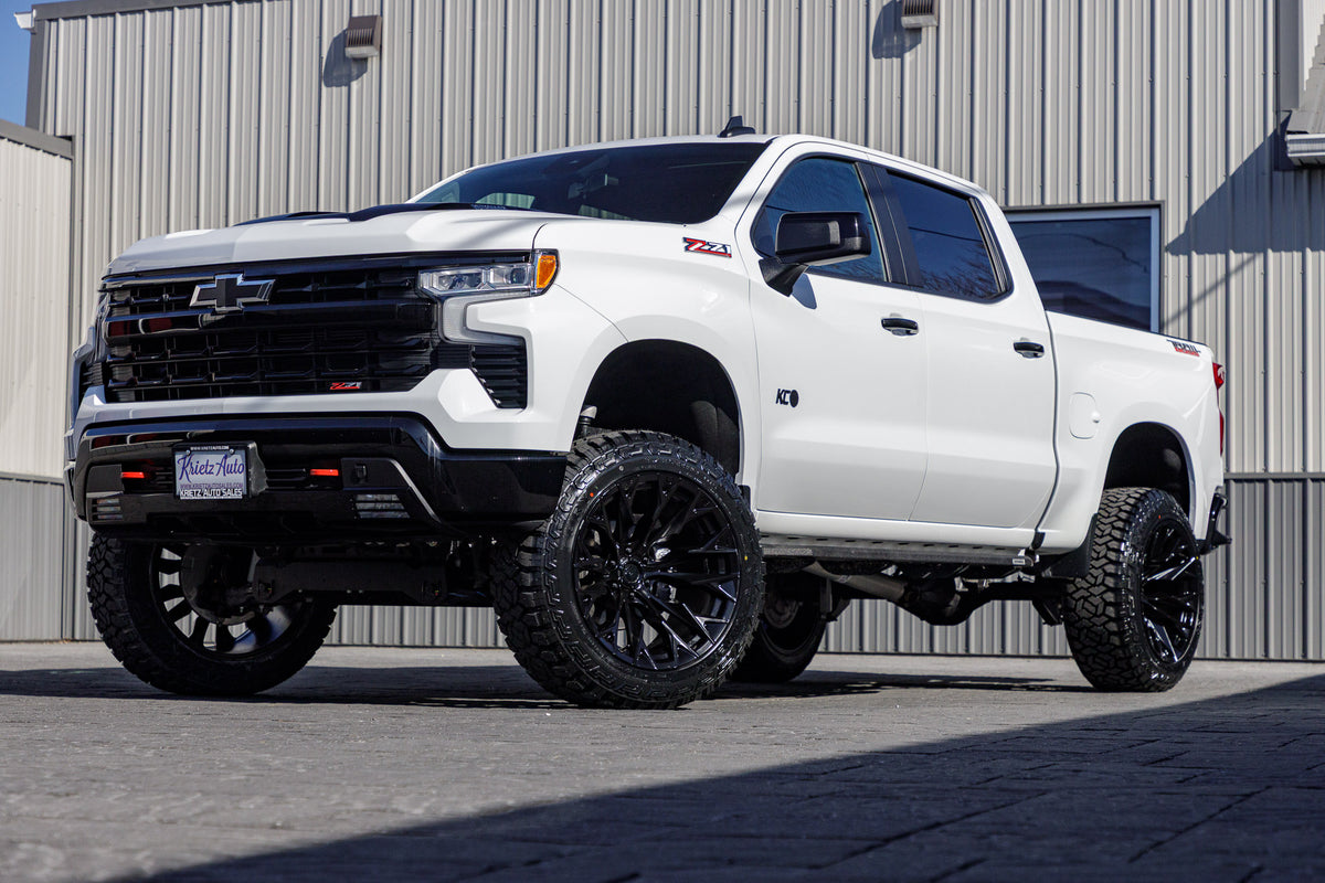 2024 Chevrolet Silverado 1500 LT Trail Boss with a 6" Rough Country lift kit, 22x12 Fuel Flame wheels, and 35" Fury Country Hunter R/T tires.