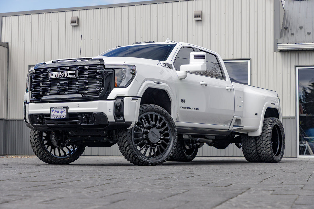 2025 GMC Sierra 3500 Denali Ultimate with a4" CST lift kit, 26x8.25 JTX Infiniti wheels, and 37" AMP Terrain Attack M/T A