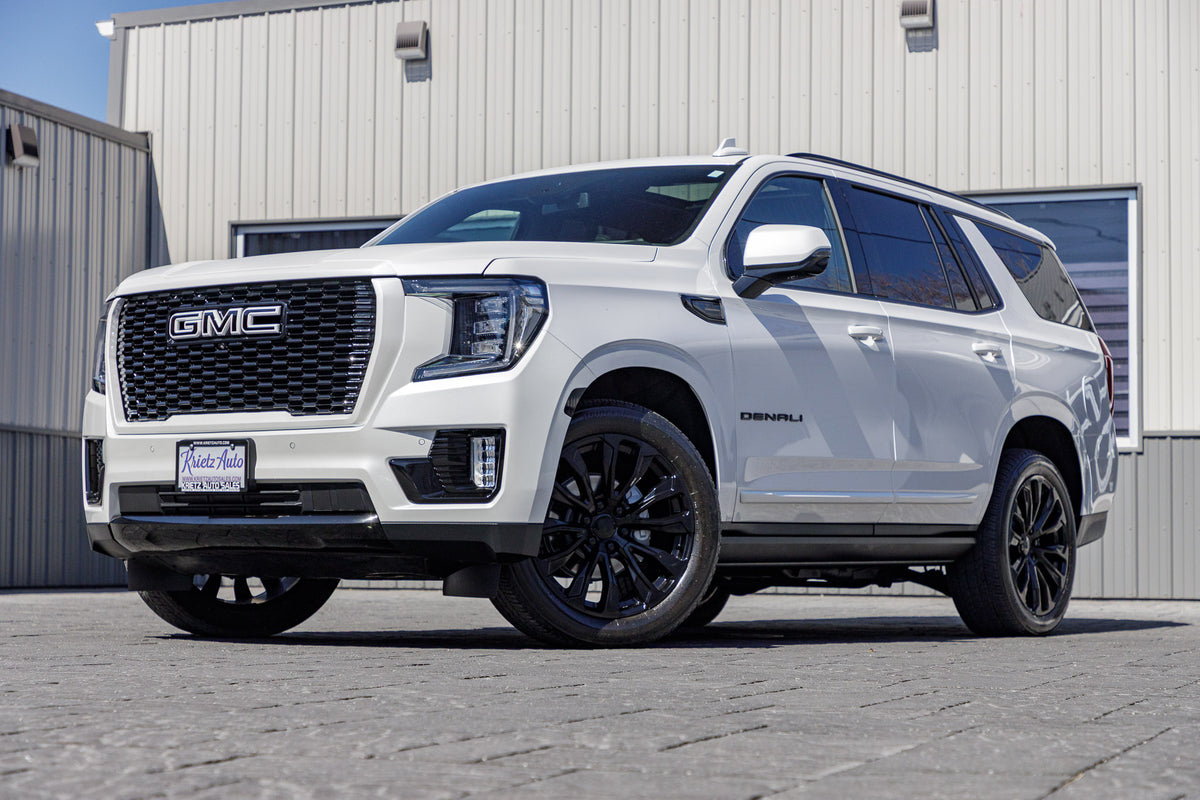 2023 GMC Yukon Denali with GMC Factory suspension, 22x9 GMC Stock wheels, and Bridgestone Alenza tires.