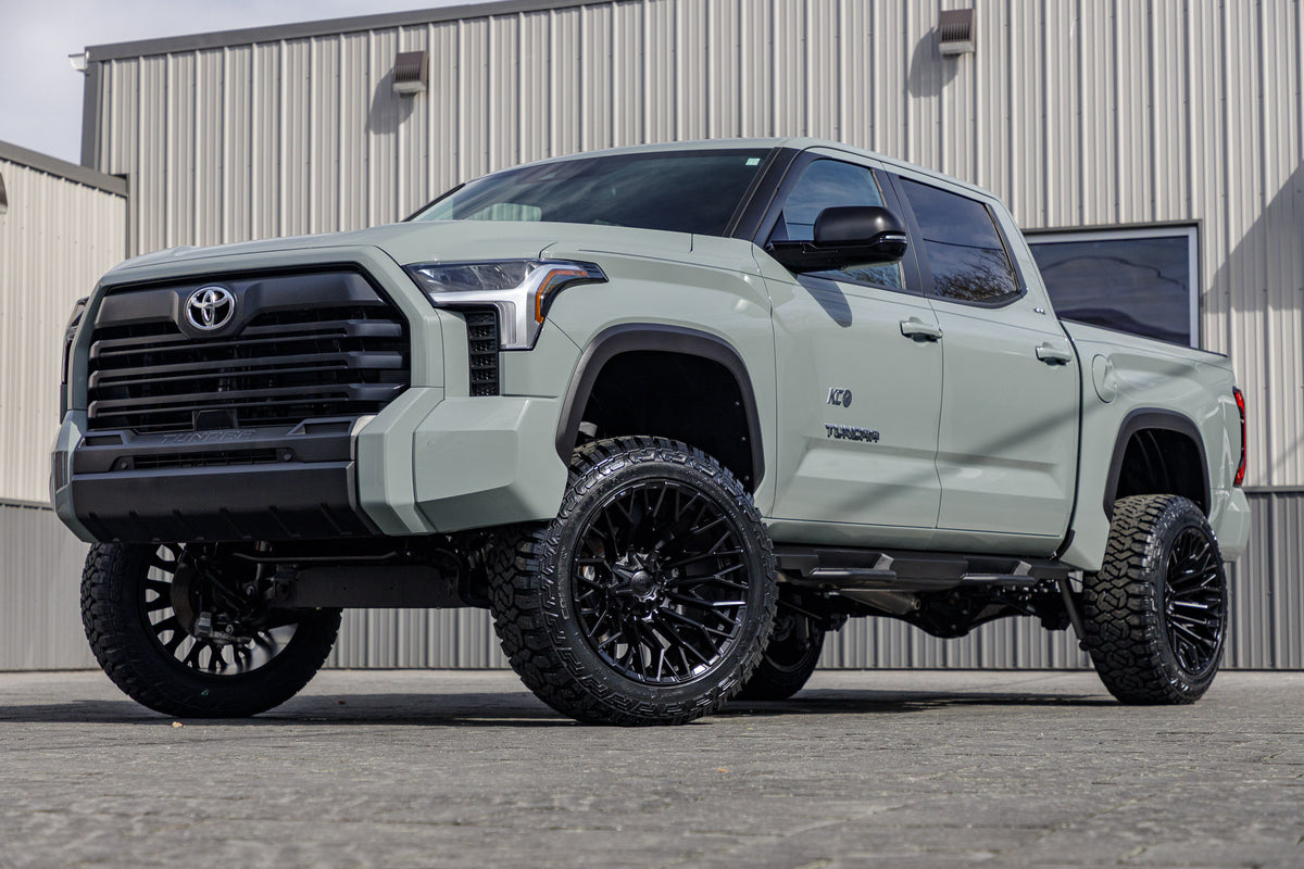 2024 Toyota Tundra SR with a 6" Rough Country lift kit, 22x12 Fuel Strike wheels, and 35" Fury Country Hunter R/T tires.