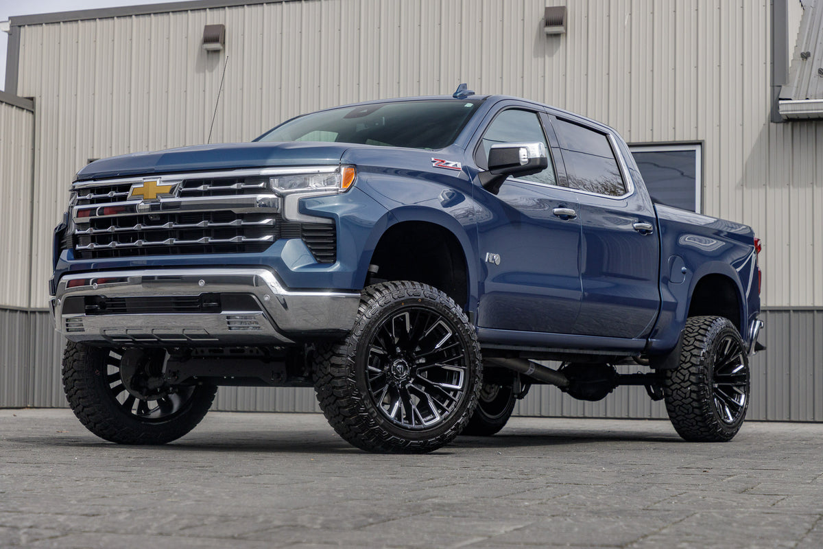 2024 Chevrolet Silverado 1500 LTZ with a 6" Rough Country lift kit, 22x12 Fuel Rebar wheels, and 35" Fury Country Hunter R/T tires.