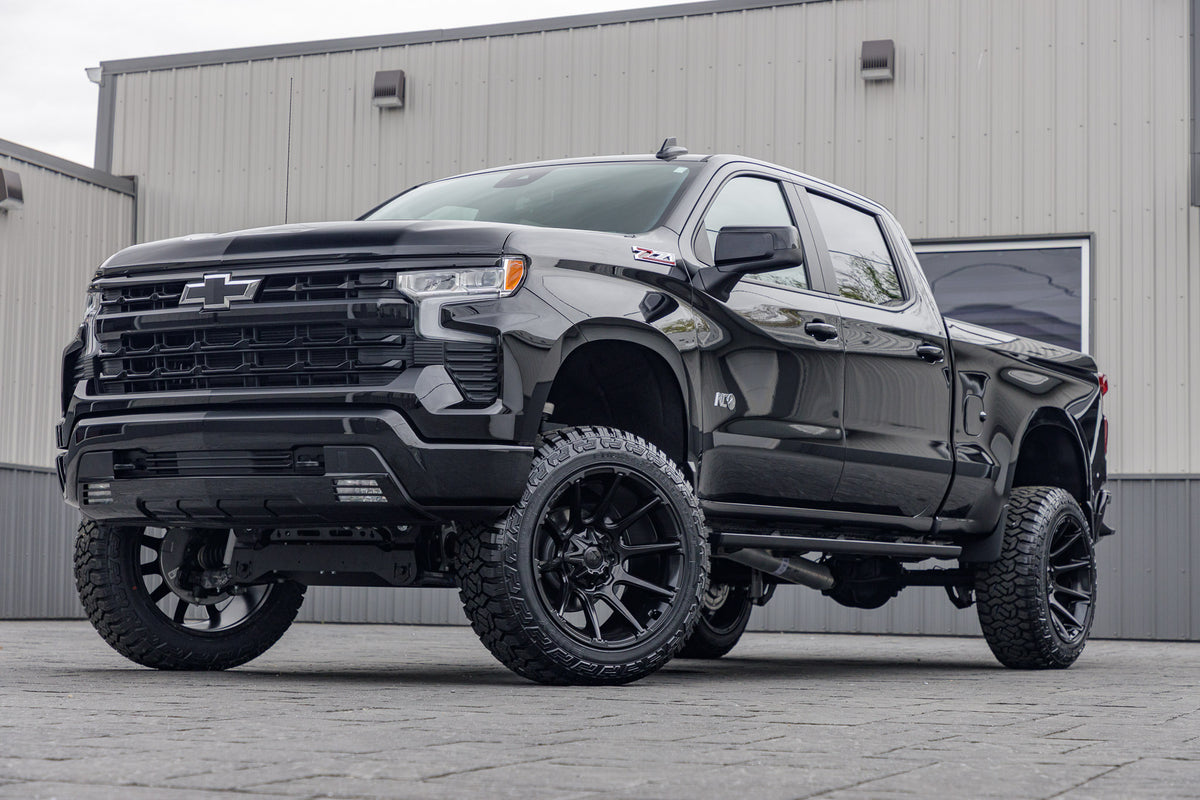 2024 Chevrolet Silverado 1500 with a 6" Rough Country lift kit, 22x12 Fuel Super C wheels, and 35" Fury Country Hunter R/T tires.