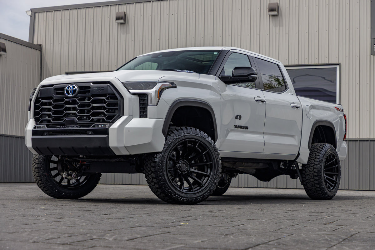 2024 Toyota Tundra Limited with a 6" Rough Country lift kit, 22x12 Fuel Burn wheels, and 35" Fury Country Hunter R/T tires.