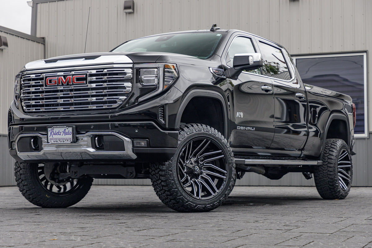2024 GMC Sierra 1500 Denali with a 6" Rough Country suspension kit, 22x12 Fuel Typhoon wheels, and 35" Fury Country Hunter R/T tires.