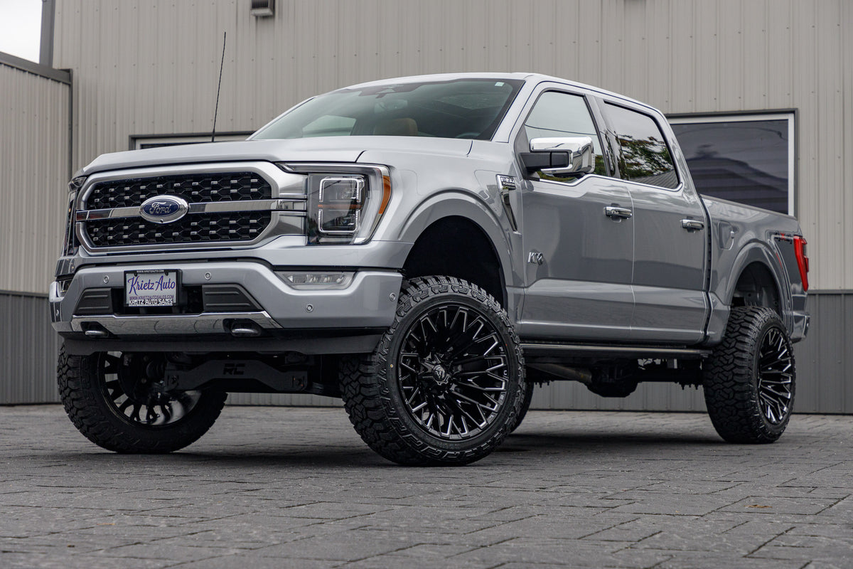 2023 Ford F-150 Platinum with a 6" Rough Country lift kit, 22x12 Fuel Strike wheels, and 35" Fury Country Hunter R/T tires.