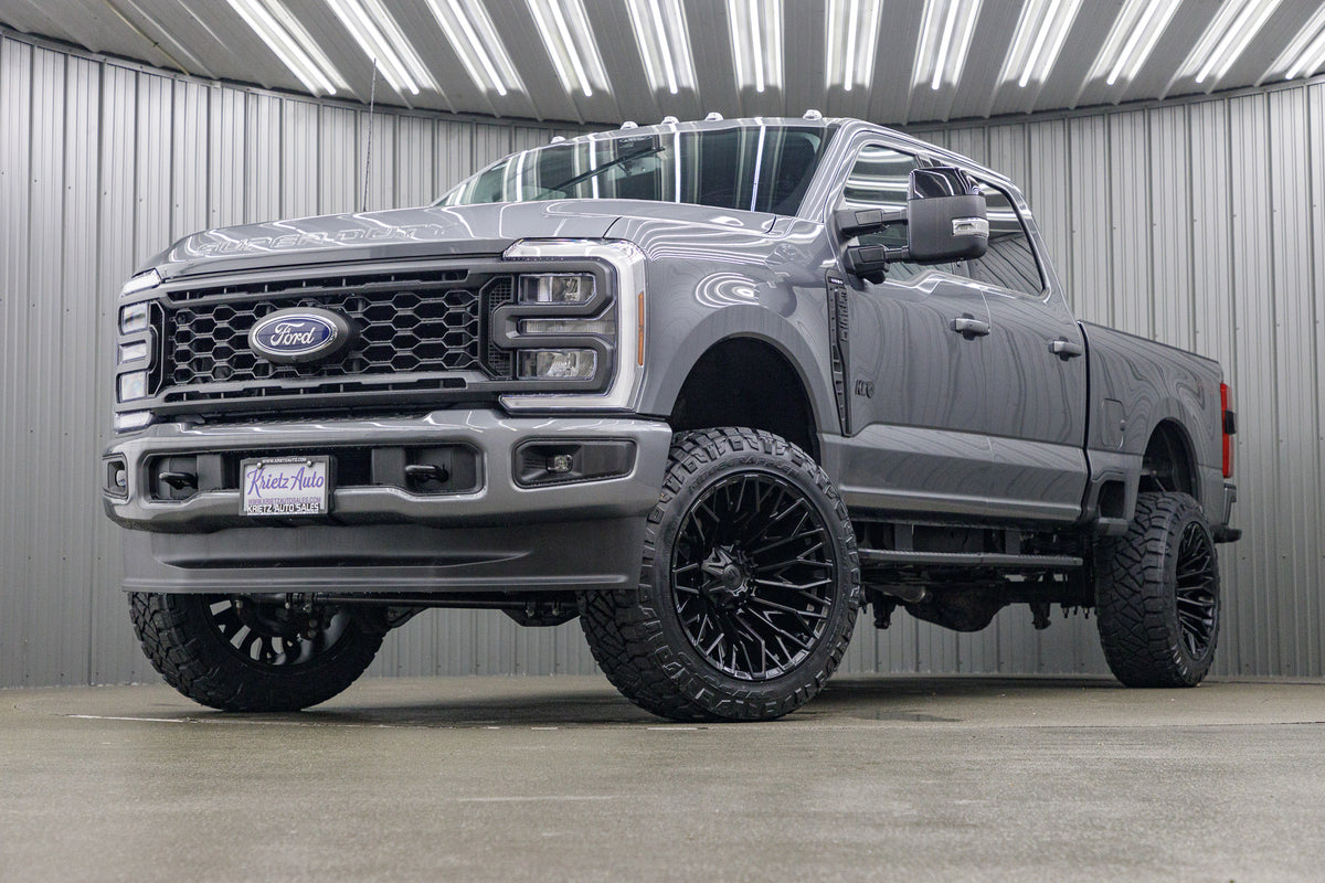 2024 Ford F-250 Super Duty Lariat with a 4" ReadyLift lift kit, 22x12 Fuel Strike wheels, and 37" Nitto Ridge Grappler tires.