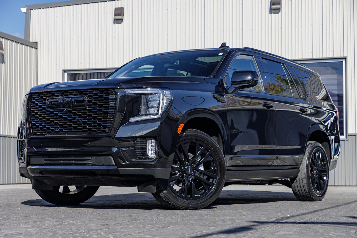 2024 GMC Yukon Denali with GMC Factory suspension, 22x9 GMC Stock wheels, and Bridgestone Alenza tires.