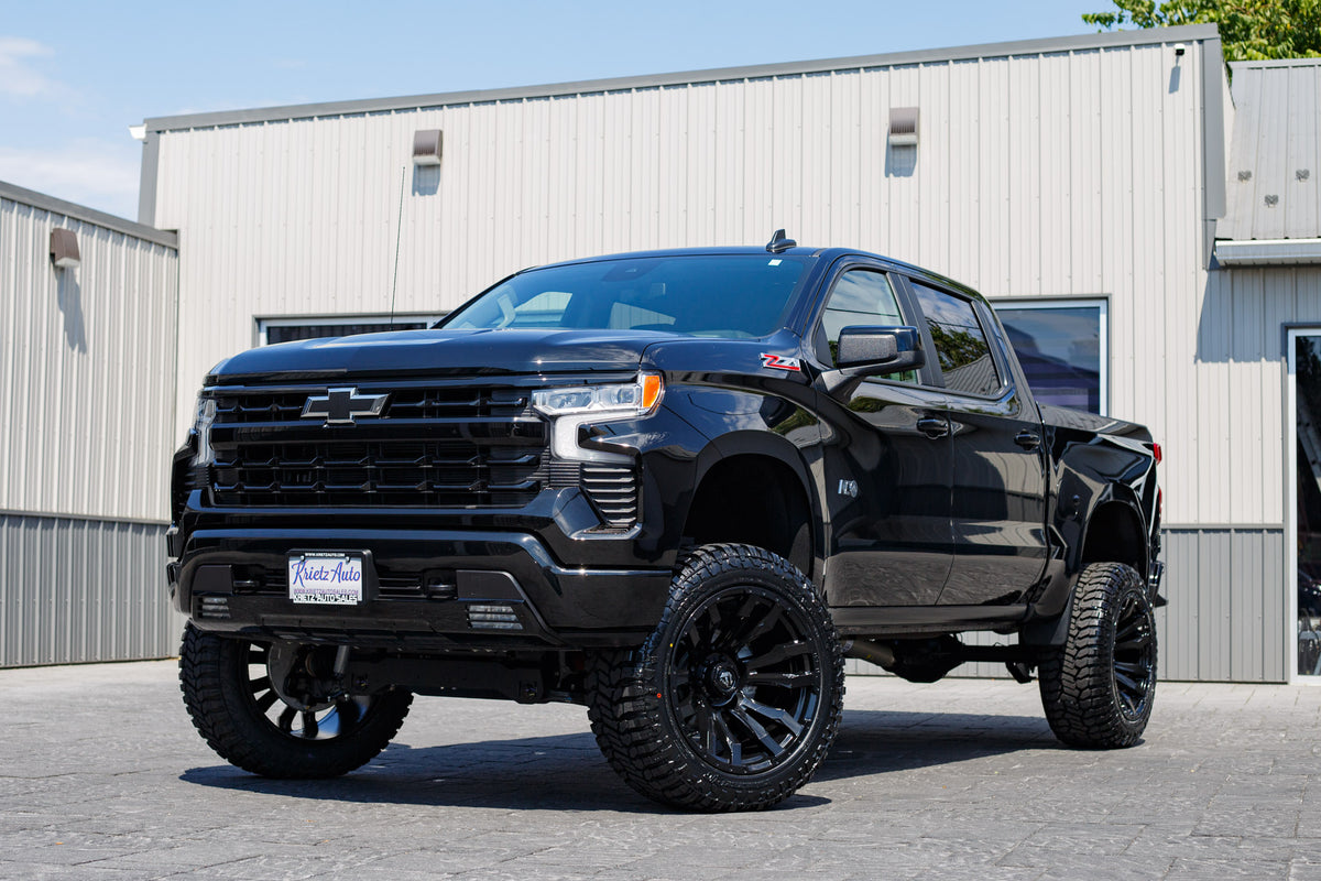 2025 Chevrolet Silverado 1500 RST with a 6" Rough Country lift kit, 22x12 Fuel Blitz wheels, and 35" Avix Trailtek R/T tires.