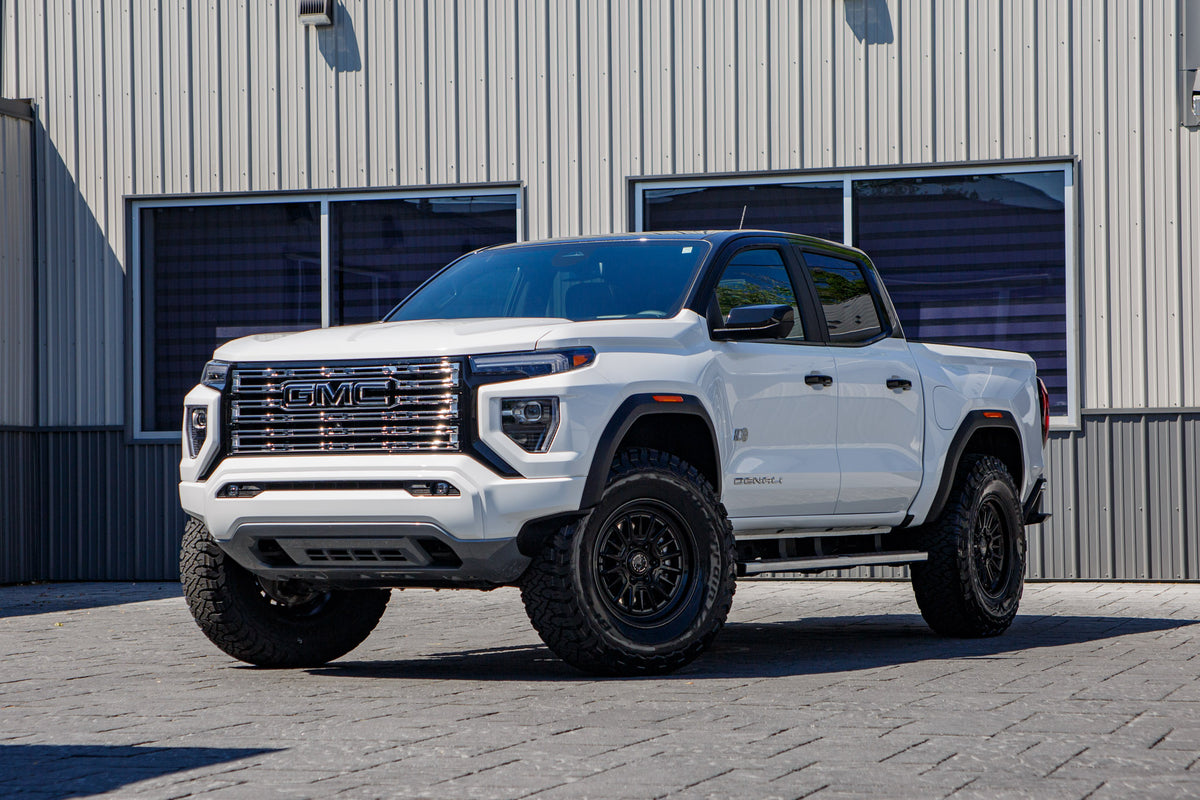 2025 GMC Canyon Denali with a 2" Cognito Leveling kit, 18x9 Black Rhino Taleo wheels, and 305/70 BFGoodrich All-Terrain T/A KO3 tires.