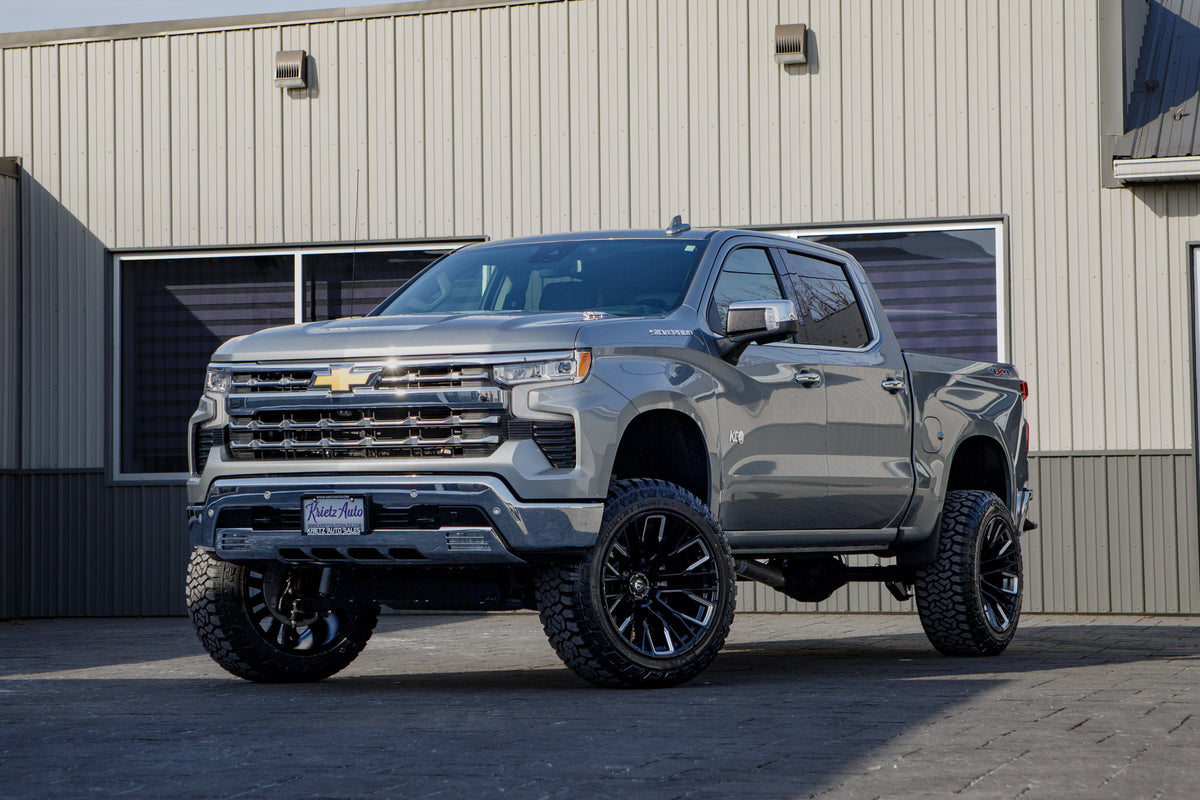 2025 Chevrolet Silverado 1500 LTZ with a 6" Rough Country lift kit, 22x12 Fuel Rebar wheels, and 35" Fury Country Hunter R/T tires.