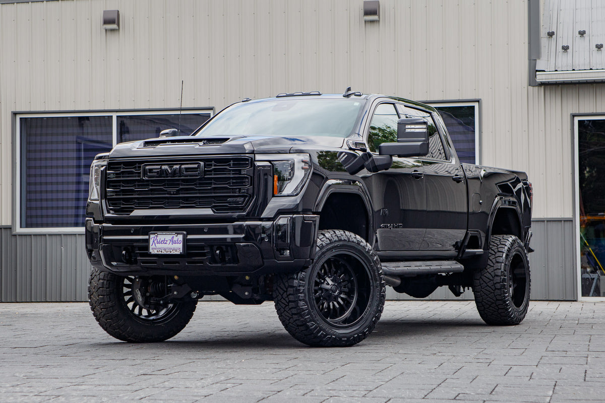 2026 GMC Sierra 2500 AT4 with a 5" BDS lift kit, 22x12 Fuel Arc wheels, and 37" Nitto Ridge Grappler tires.