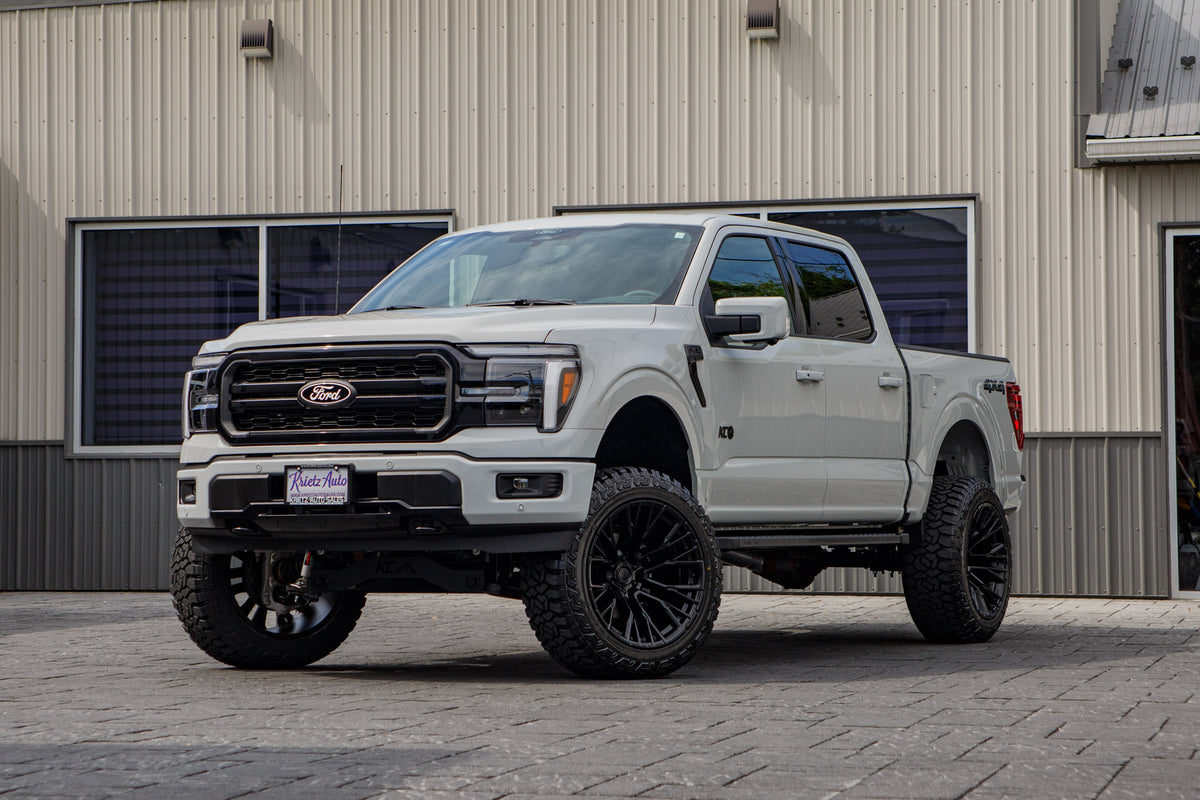 2026 Ford F-150 Lariat with a 6" Rough Country lift kit, 22x12 Fuel Rebar wheels, and 35" Fury Country Hunter R/T tires.