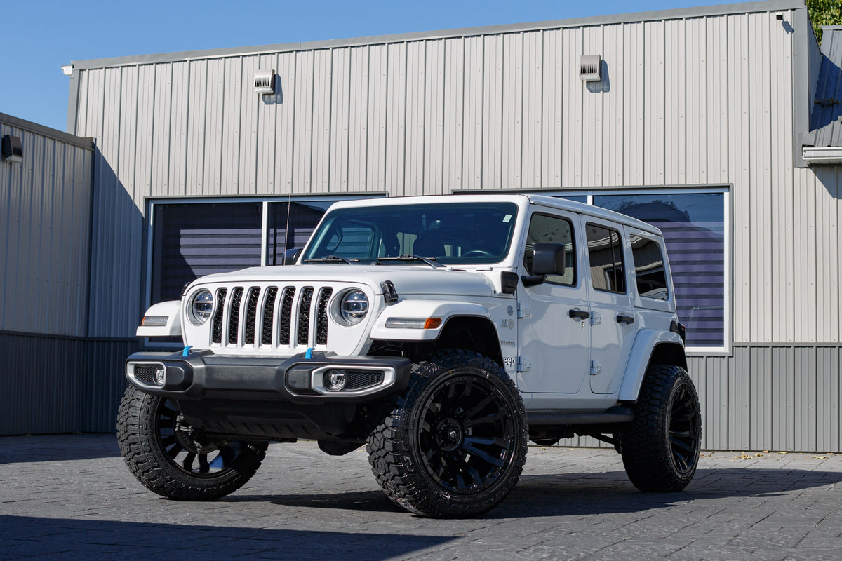 2022 Jeep Wrangler Unlimited Sahara 4XE with a 2.5" Rough Country lift kit, 22x12 Fuel Blitz wheels, and 35" Fury Country Hunter R/T tires.