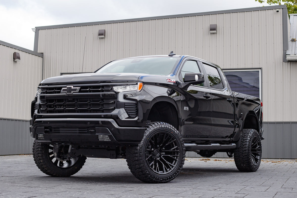 2025 Chevrolet Silverado 1500 RST with a 6" Rough Country lift kit, 22x12 Fuel Rebar wheels, and 35" Avix Trailtek R/T tires.