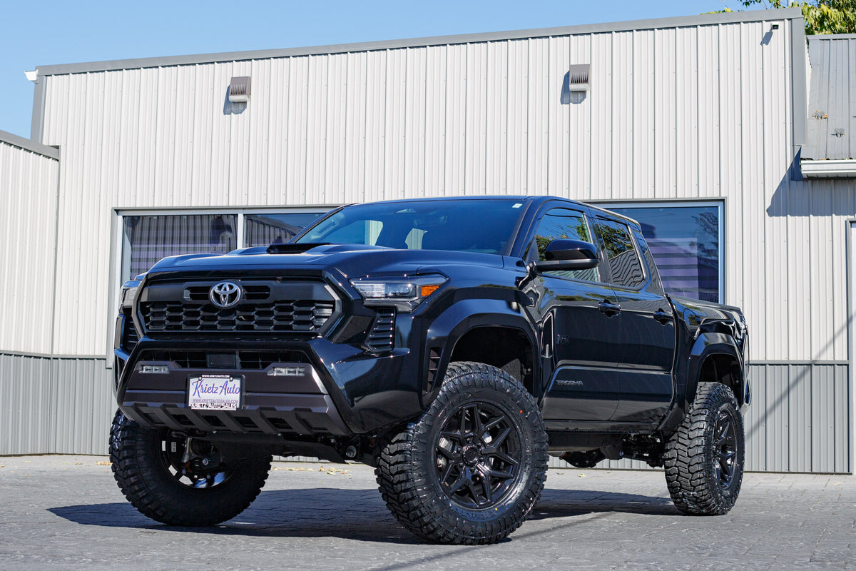 2025 Toyota Tacoma with a 3" ReadyLift lift kit, 18x9 Fuel Flux wheels, and 35" Avix Trailtek R/T tires.