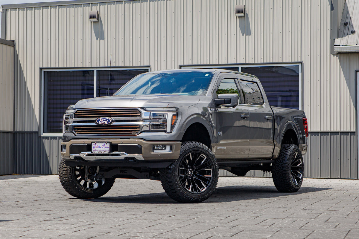 2025 Ford F-150 King Ranch with a 6" Rough Country lift kit, 22x12 Fuel Rebar wheels, and 35" Fury Country Hunter R/T tires.