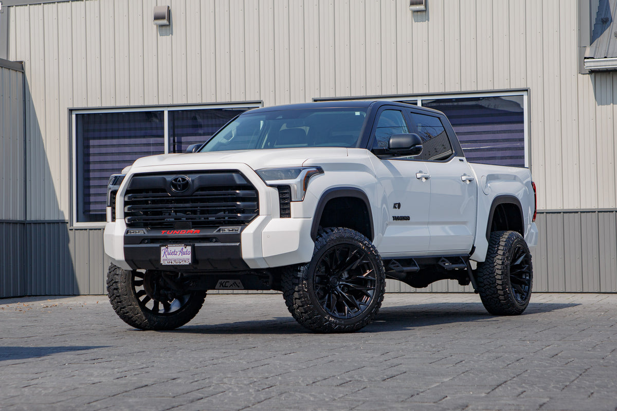 2023 Toyota Tundra SR5 with a 6" Rough Country lift kit, 22x12 Fuel Flame wheels, and 35" Fury Country Hunter R/T tires.