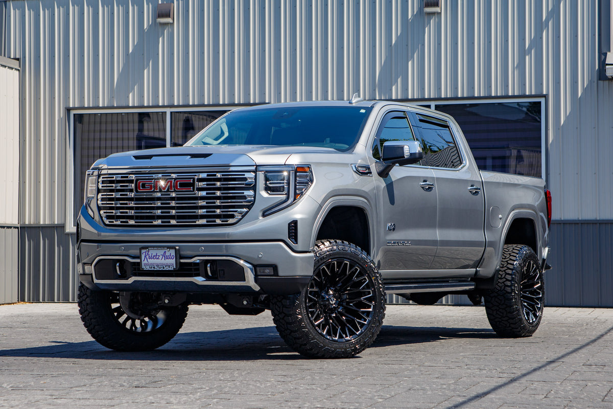 2024 GMC Sierra 1500 Denali with a 6" Rough Country lift kit, 22x12 Fuel Strike wheels, and 35" Fury Country Hunter R/T tires.