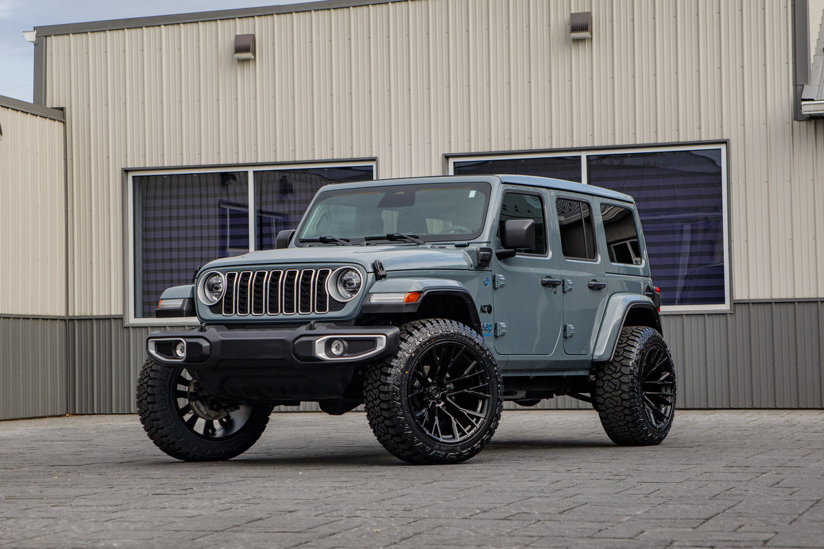 2025 Jeep Wrangler Sahara 4XE with a 2.5" Rough Country lift kit, 22x12 Fuel Rebar wheels, and 35" Fury Country Hunter R/T tires.