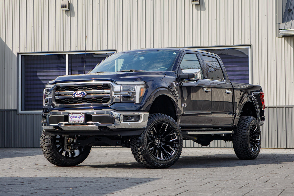 2025 Ford F-150 Lariat with a 6" Rough Country lift kit, 22x12 Fuel Rebar wheels, and 35" Fury Country Hunter R/T tires.