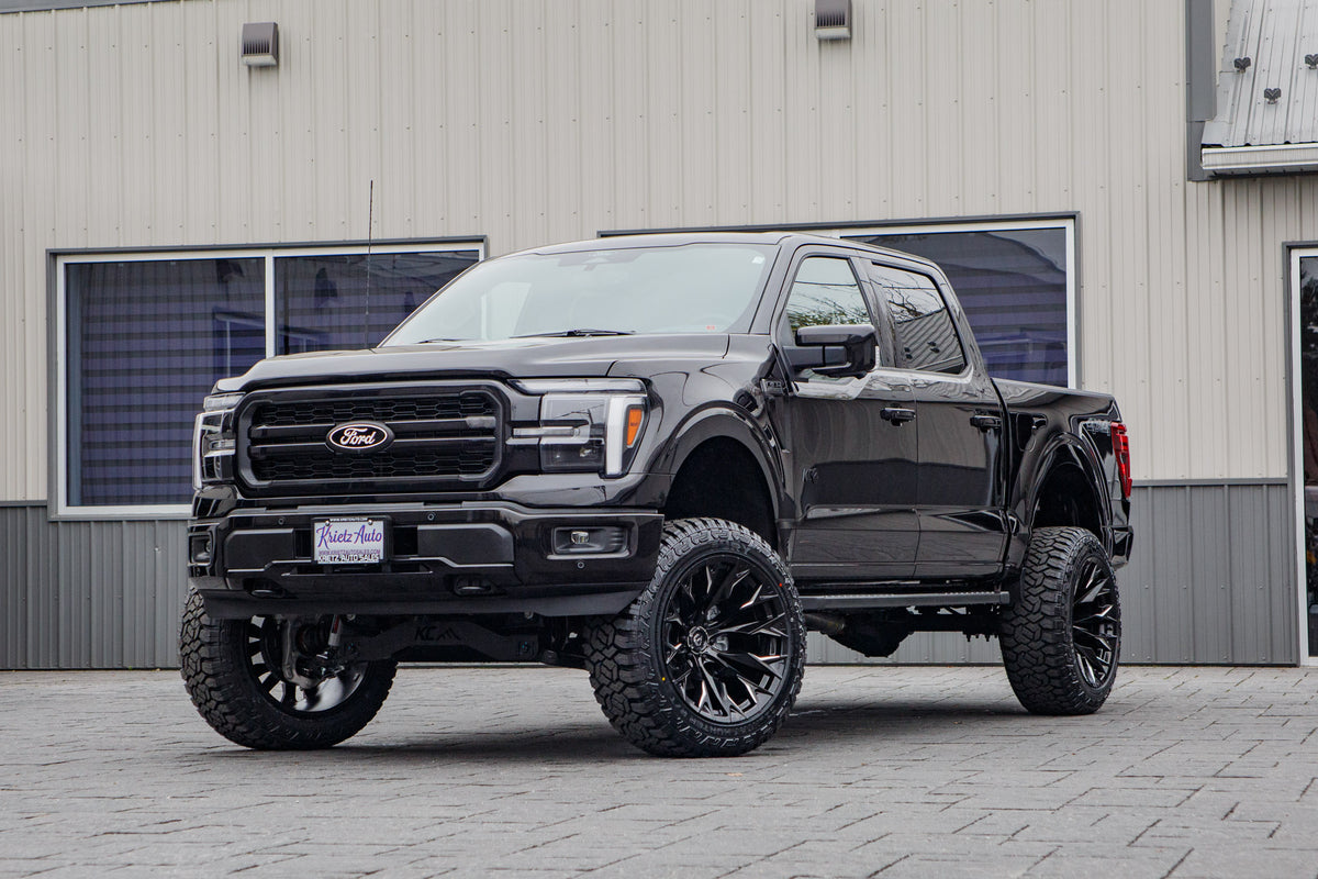 2025 Ford F-150 Lariat with a 6" Rough Country lift kit, 22x12 Fuel Flame wheels, and 35" Fury Country Hunter R/T tires.