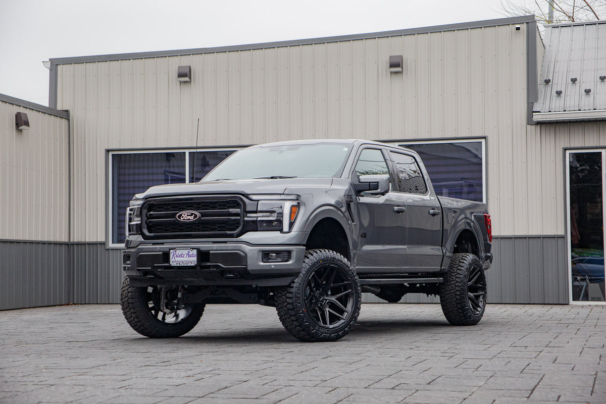 2025 Ford F-150 Lariat with a 6" Rough Country lift kit, 22x12 Fuel Flux wheels, and 35" Fury Country Hunter R/T tires.