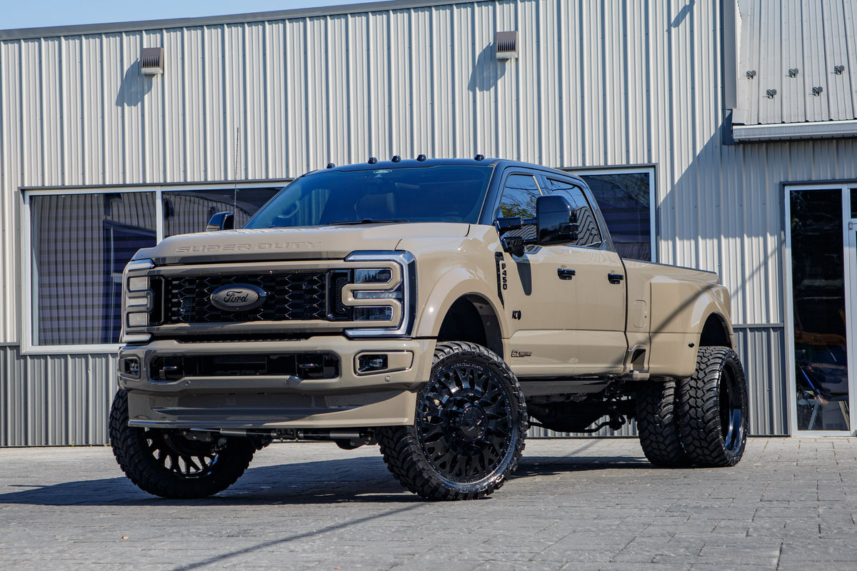 2026 Ford F-450 Super Duty Platinum with a 4" Wicked lift kit, 26x8.25 American Force Evo wheels, and 37" AMP Terrain Attack M/T A tires.