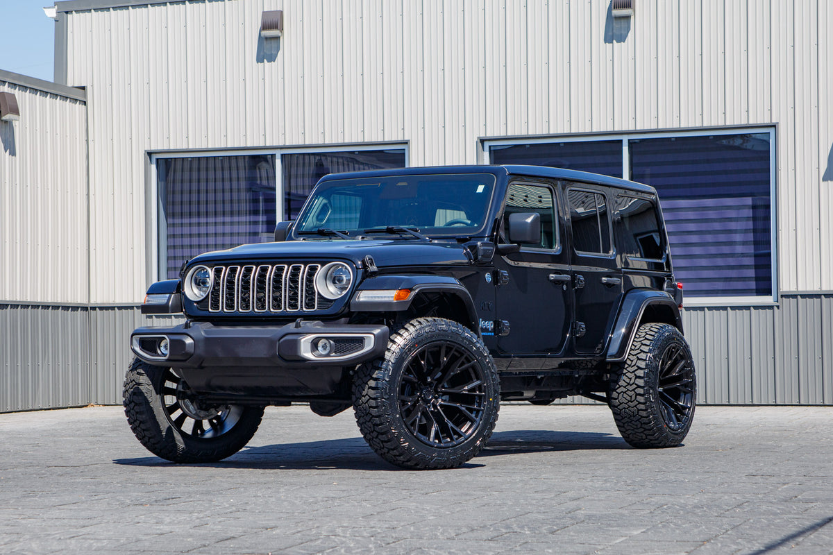 2025 Jeep Wrangler Sahara 4XE with a 2.5" Rough Country lift kit, 22x12 Fuel Rebar wheels, and 35" Fury Country Hunter R/T tires.