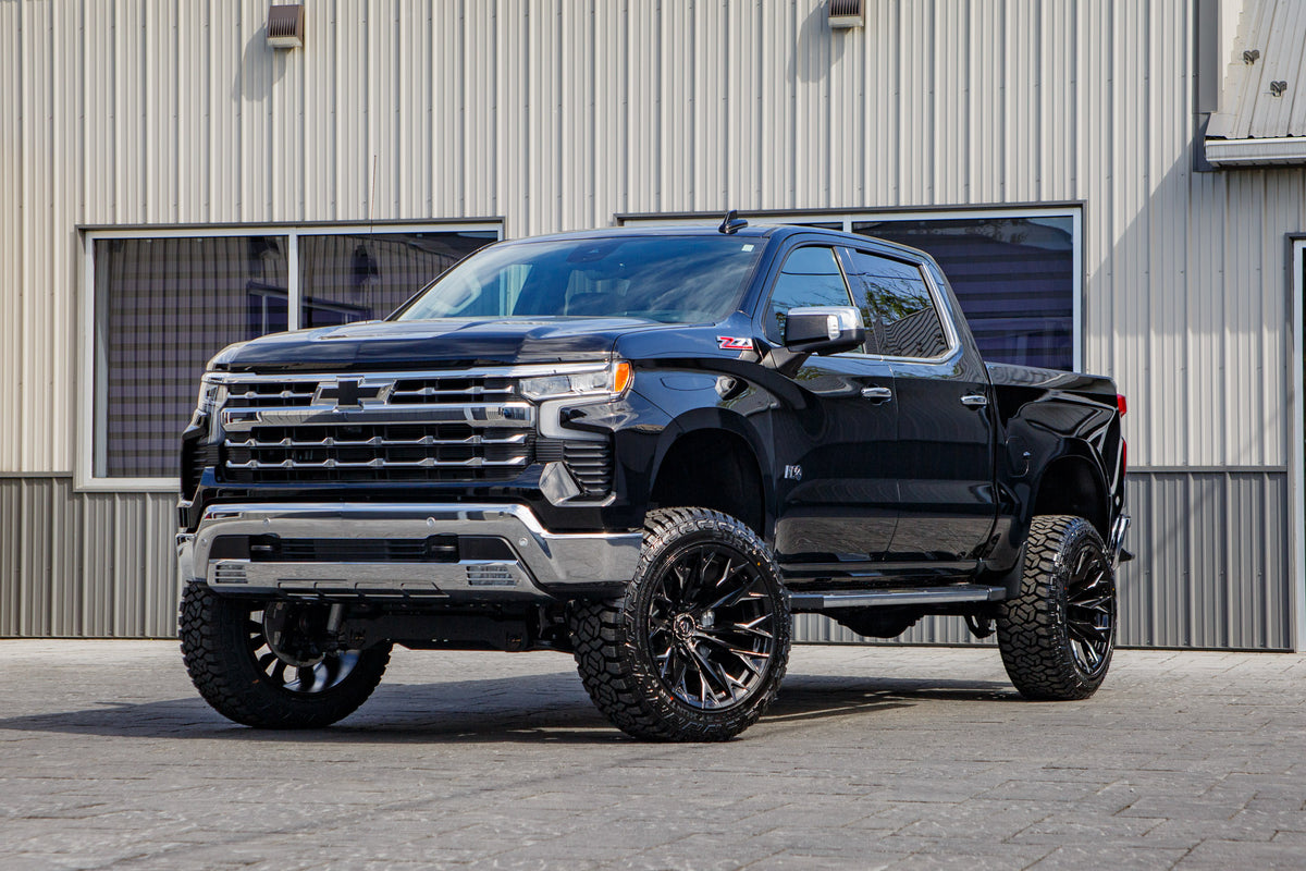 2026 Chevrolet Silverado 1500 LTZ with a 6" Rough Country lift kit, 22x12 Fuel Flame wheels, and 35" Fury Country Hunter R/T tires.