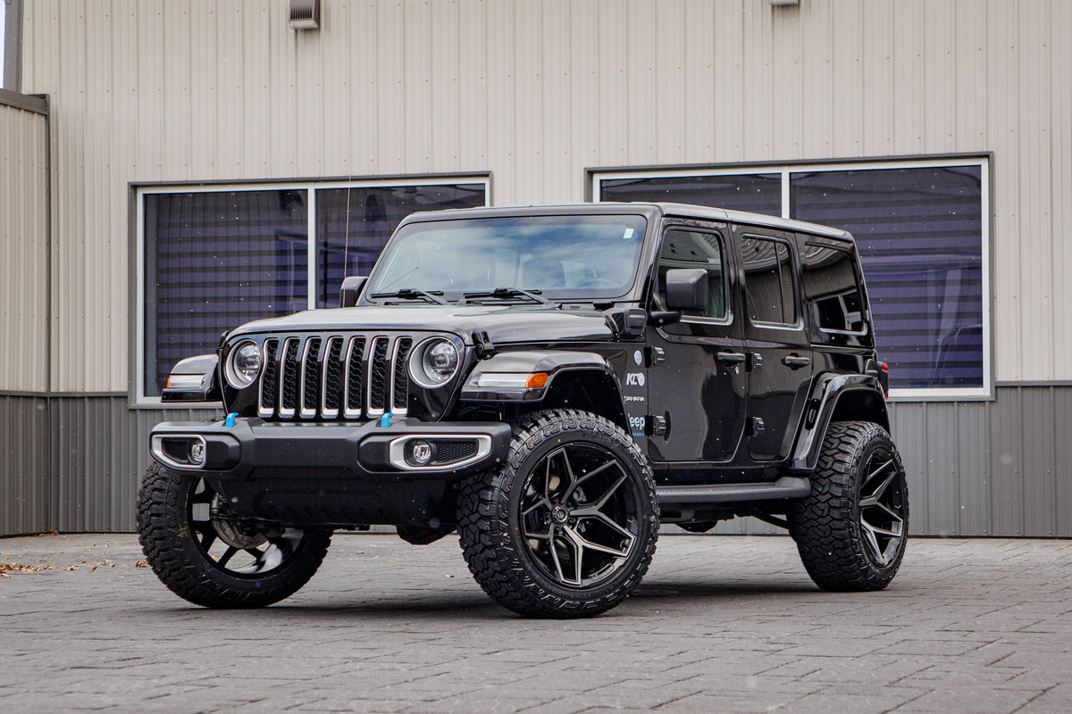 2023 Jeep Wrangler Sahara 4XE with a 2.5" Rough Country lift kit, 22x12 Fuel Flux wheels, and 35" Fury Country Hunter R/T tires.