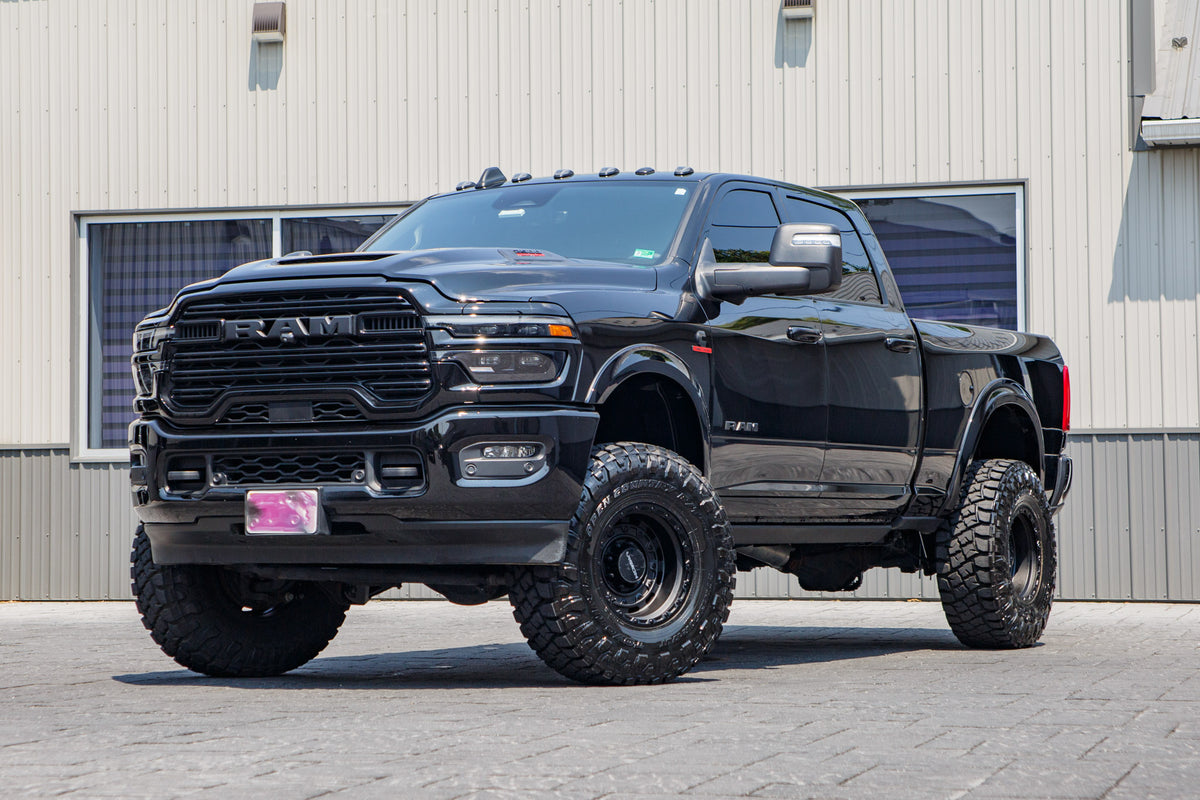 2025 Ram 2500 Laramie with a 4" BDS lift kit, 17x10 Vision Wheel 403 Tactical wheels, and 37" Toyo Open Country R/T Pro tires.