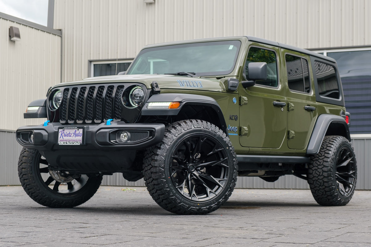 2023 Jeep Wrangler Unlimited Willys 4xe Green with 2.5 inch rough country lift kit, 22x12 fuel flame wheels and 35 inch fury country hunter tires