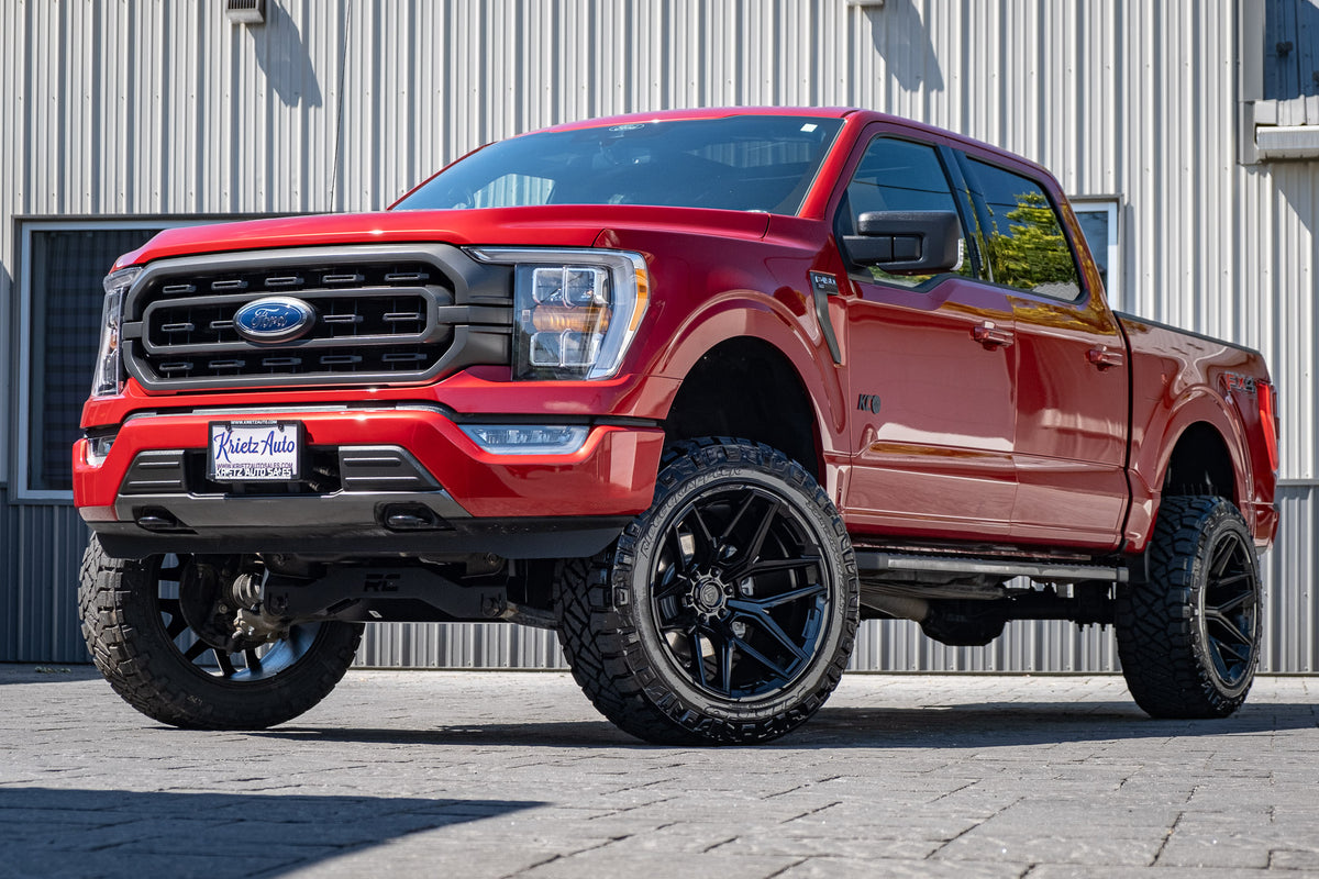 2021 Ford F-150 XLT Red with 6 inch Rough Country Lift kit with 22x12 Fuel Flux Wheels and 35 inch Nitto Ridge Grappler Tires