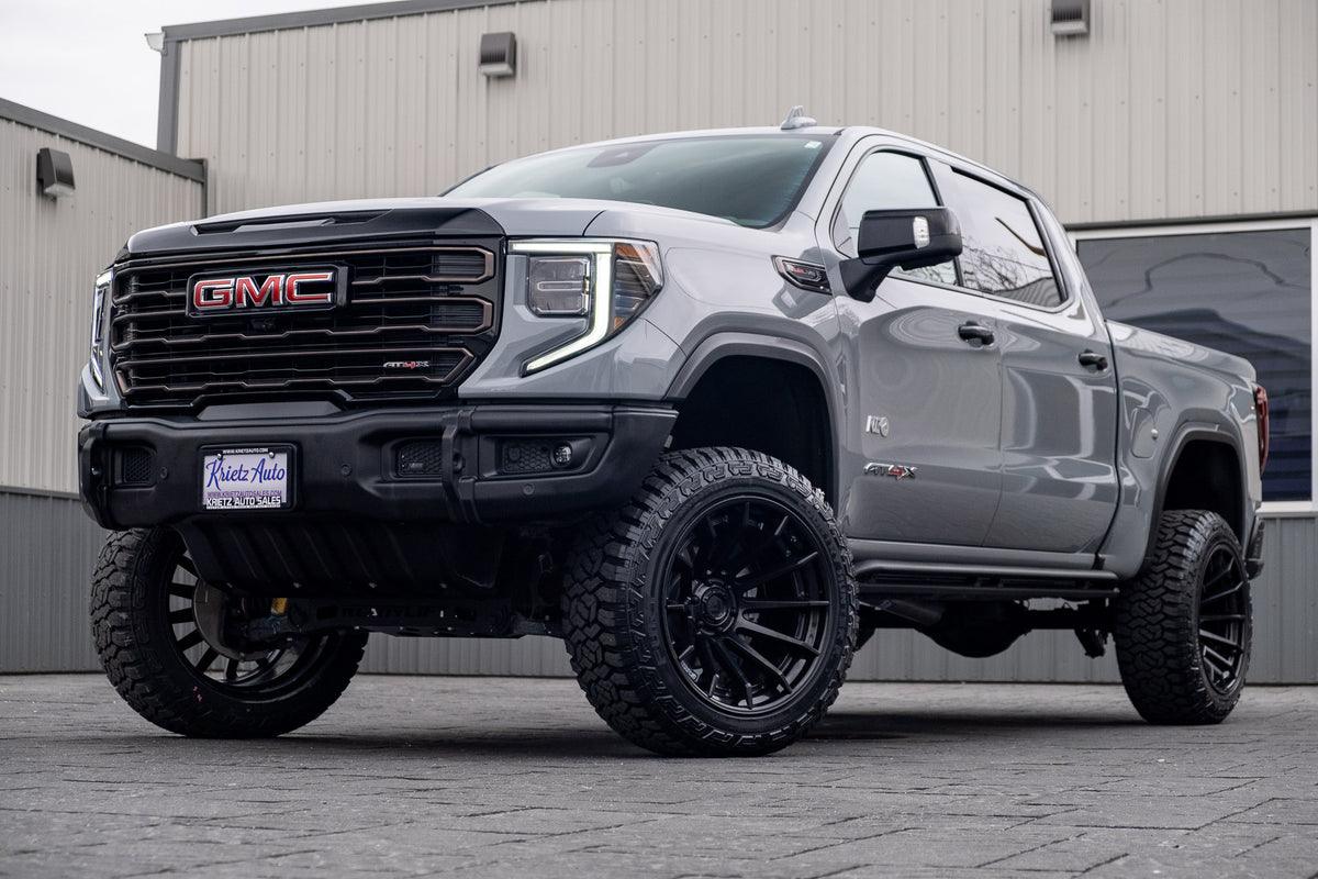 2024 GMC Sierra 1500 AT4X with a 4" ReadyLift lift kit, 22x12 Fuel Burn wheels, and 35" Fury Country Hunter R/T tires.