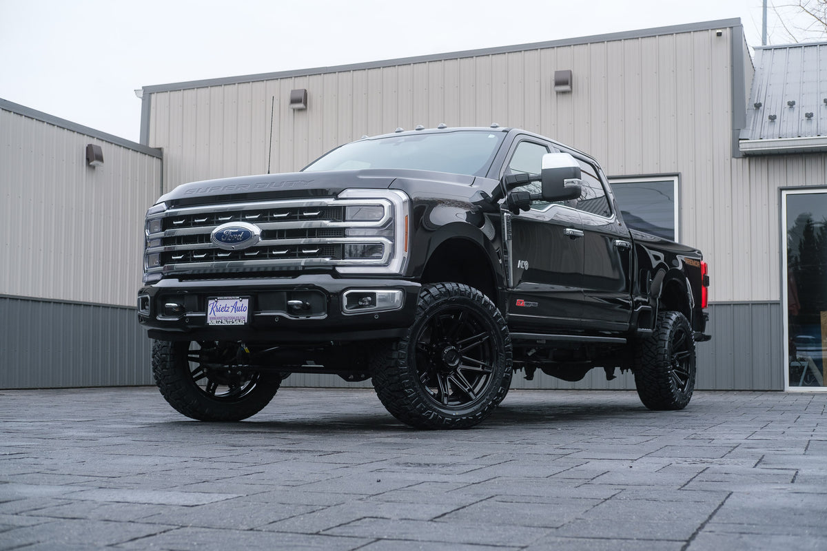 2024 Ford F-350 Super Duty Platinum with a 2.5" ReadyLift leveling kit, 22x10 Fuel Brawl wheels, and 35" Nitto Ridge Grappler tires.