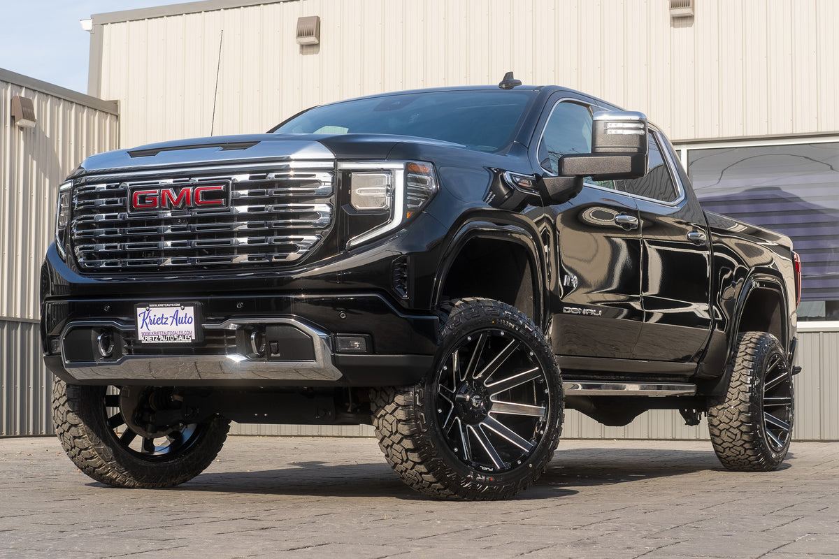 2024 GMC Sierra 1500 Denali with a 6" Rough Country lift kit, 22x12 Fuel Contra wheels, and 35" Fury Country Hunter R/T tires.