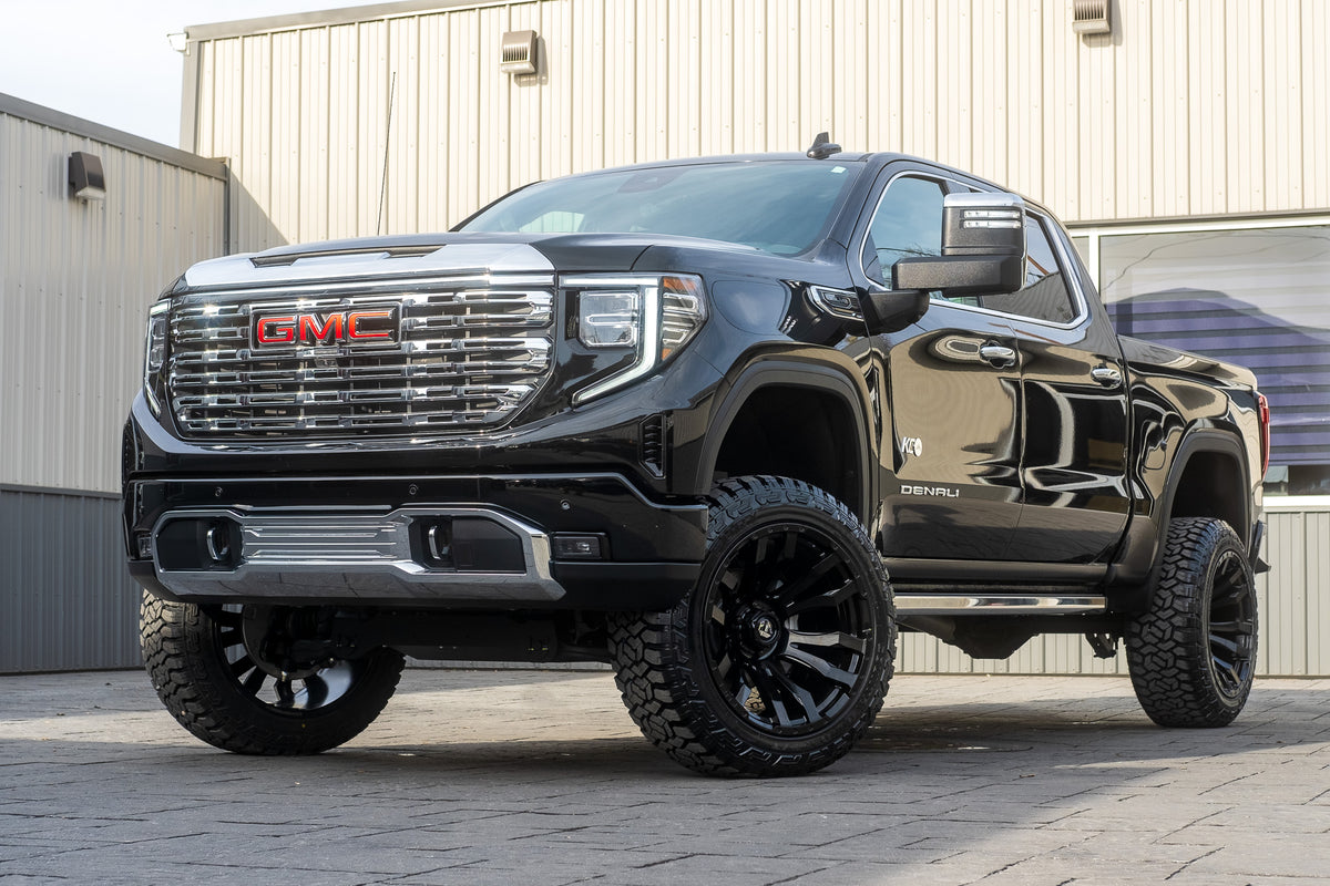 2024 GMC Sierra 1500 Denali with a 6" Rough Country lift kit, 22x12 Fuel Blitz wheels, and 35" Fury Country Hunter R/T tires.