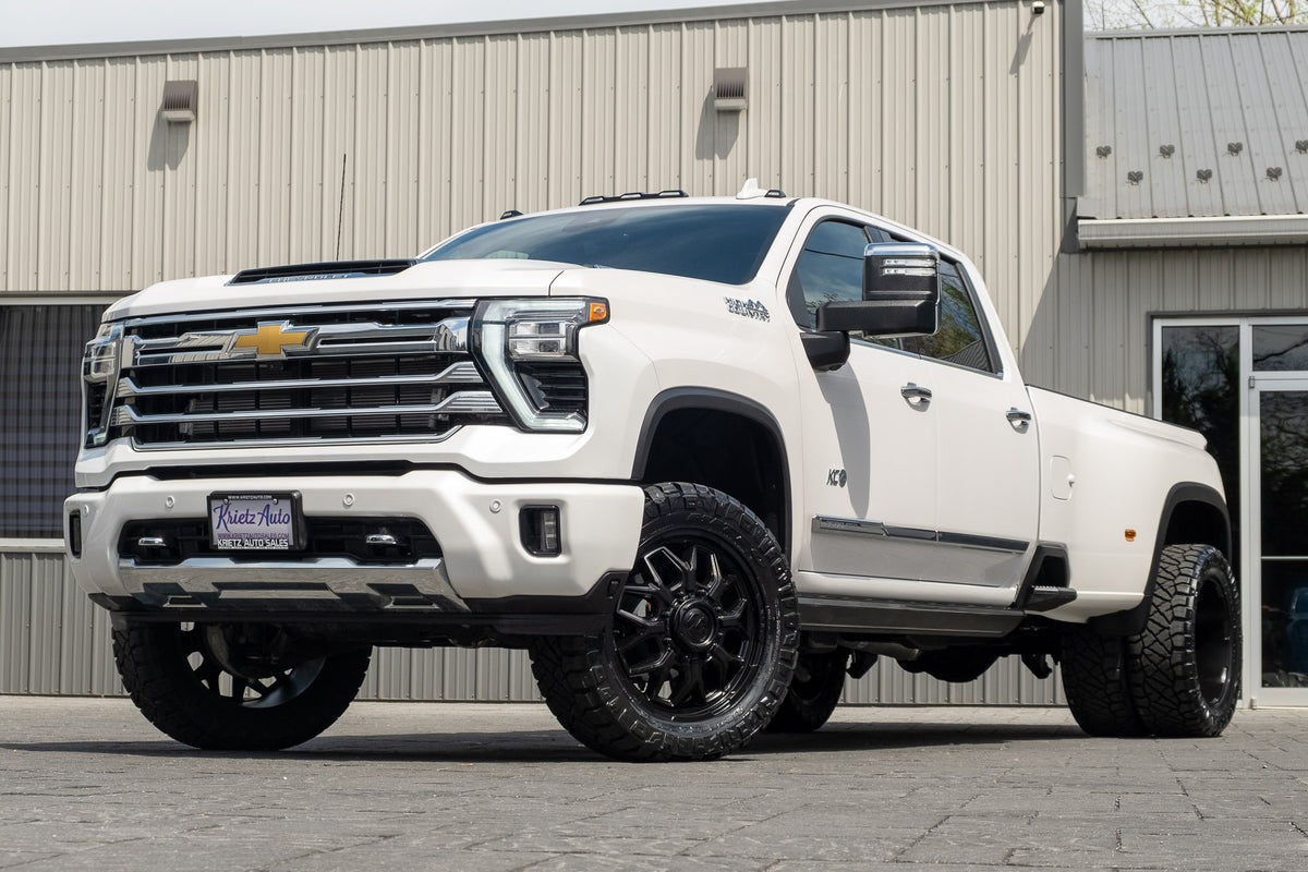 2025 Chevrolet Silverado 3500 High Country with a 3" Cognito leveling kit, 22x8.25 Fuel Flux wheels, and 35" Nitto Ridge Grappler tires.
