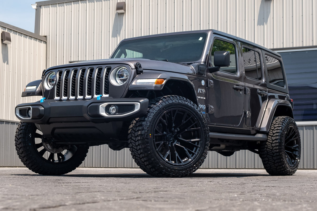 2022 Jeep Wrangler Unlimited Sahara 4XE with a 2.5" Rough Country lift kit, 22x12 Fuel Rebar wheels, and 35" Avix Trailtek R/T tires.