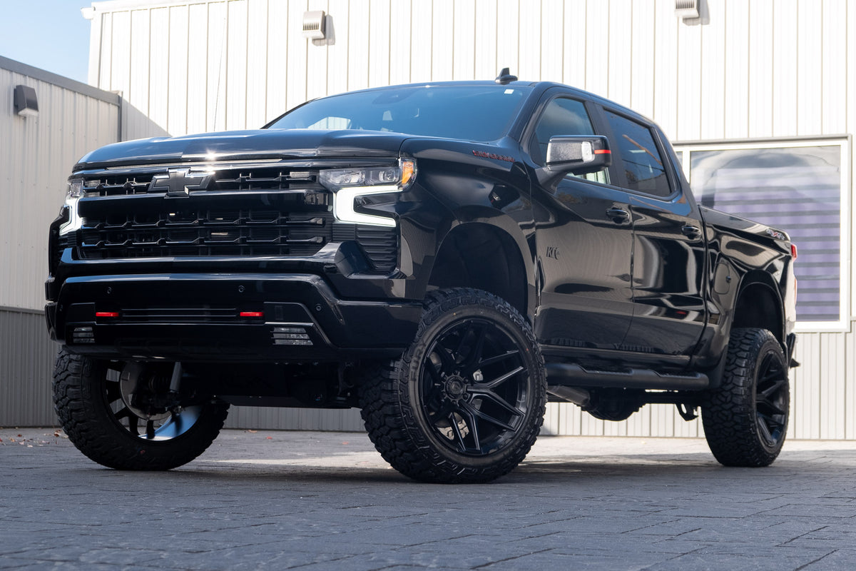 2025 Chevrolet Silverado 1500 RST with a 6" Rough Country lift kit, 22x12 Fuel Flux wheels, and 35" Fury Country Hunter R/T tires.