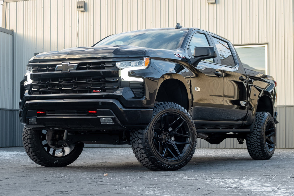 2025 Chevrolet Silverado 1500 LT Trail Boss with a 6" Rough Country lift kit, 22x12 Fuel Flux wheels, and 35" Fury Country Hunter R/T tires.