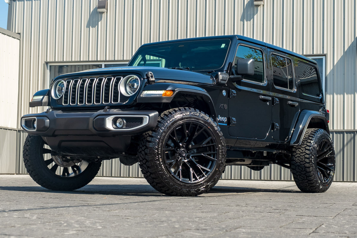 2025 Jeep Wrangler Sahara 4XE with a 2.5" Rough Country lift kit, 22x12 Fuel Rebar wheels, and 35" Fury Country Hunter R/T tires.