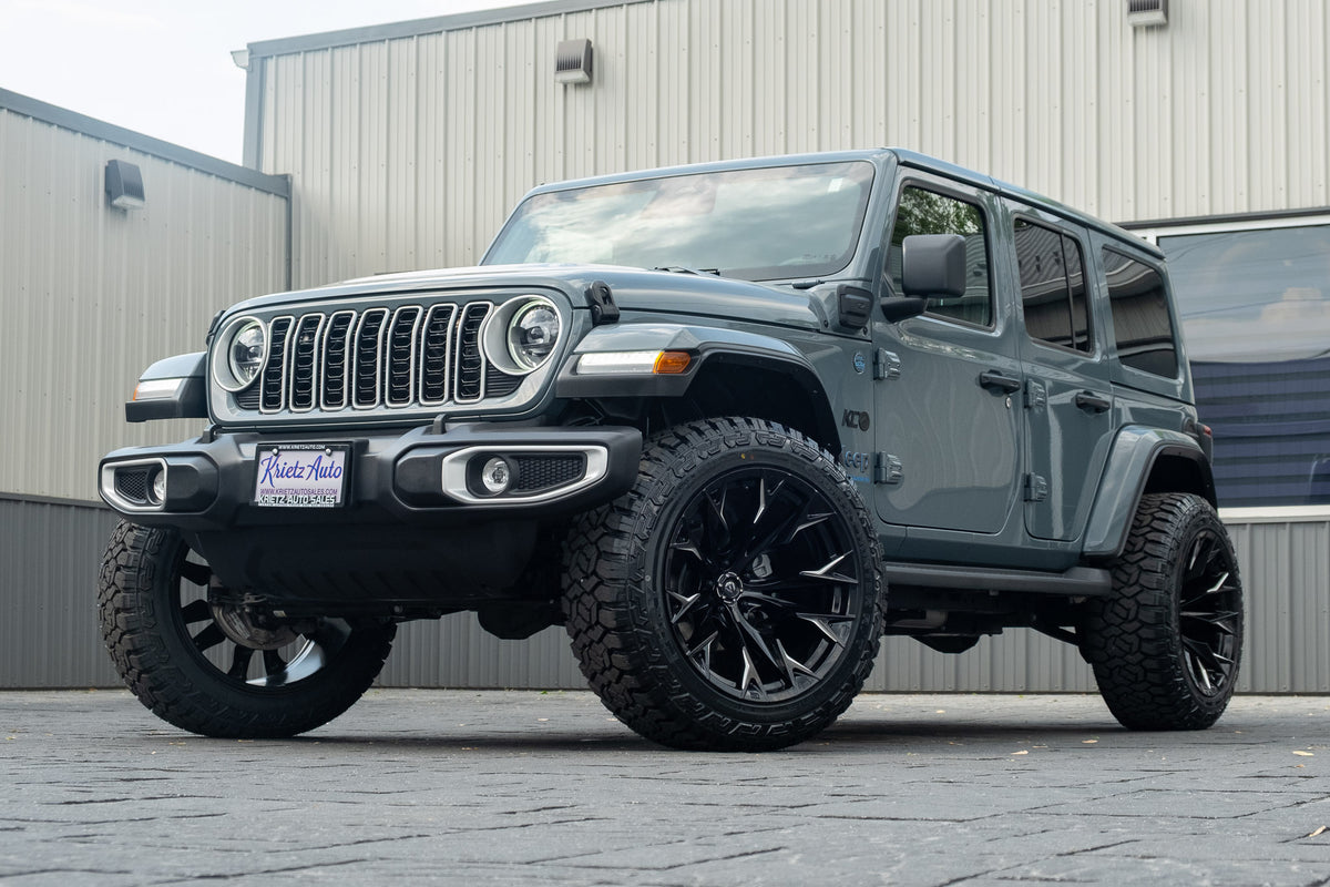 2025 Jeep Wrangler Sahara 4XE with a 2.5" Rough Country lift kit, 22x12 Fuel Flame wheels, and 35" Fury Country Hunter R/T tires.